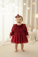 Baby Girl with Red Bow